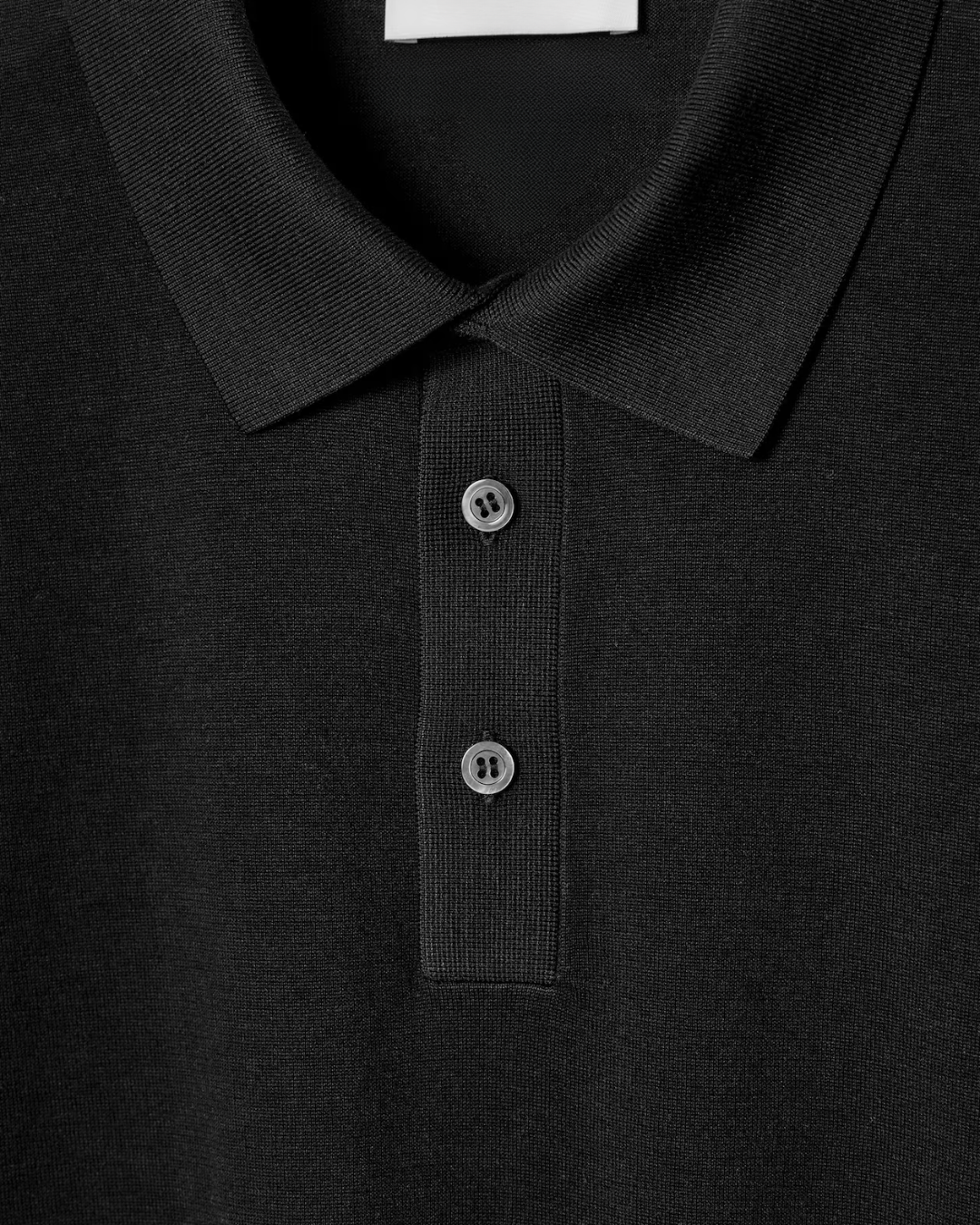 Luxuriöses Strick-Poloshirt in Schwarz