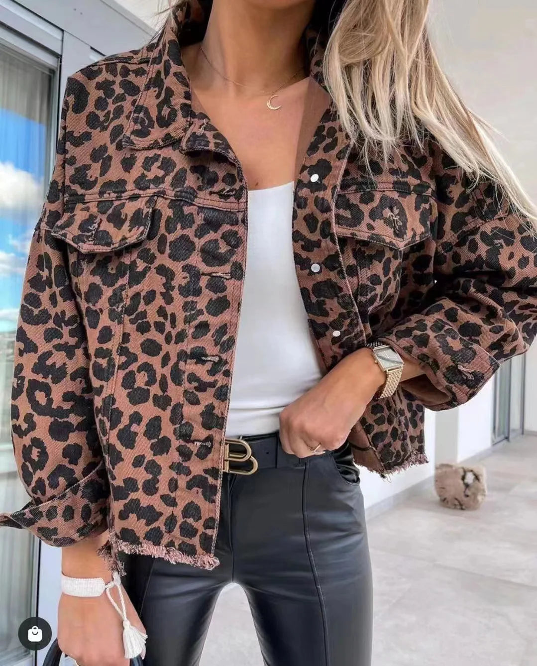 Denim jacket with leopard pattern