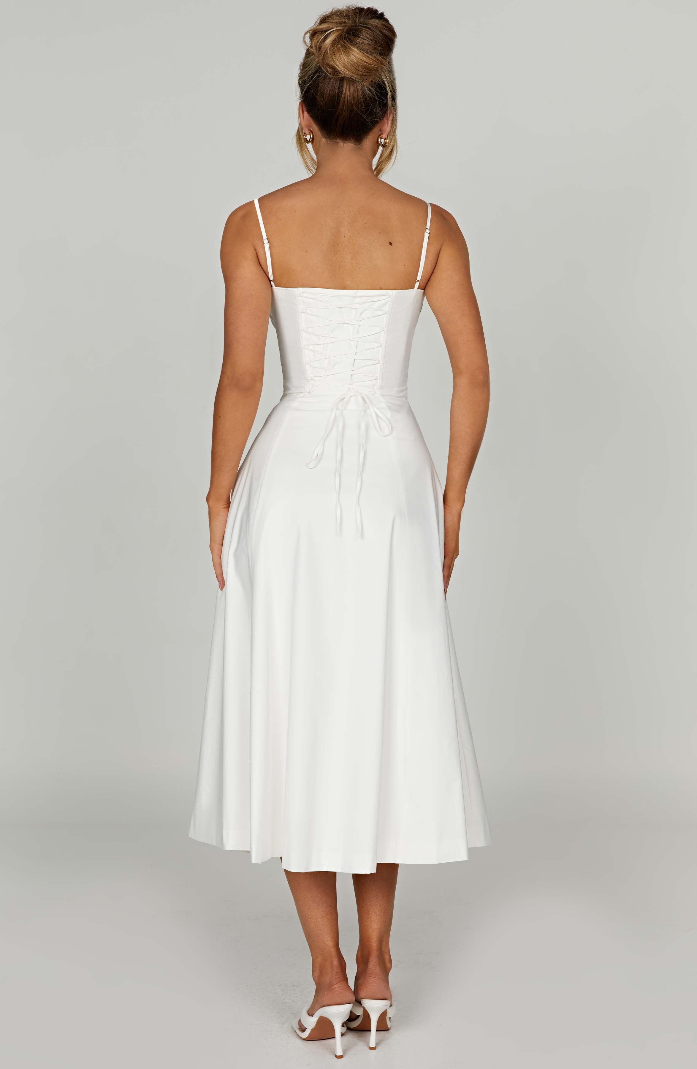 Elegantes Midi-Kleid mit floralen Mustern und Taillierung