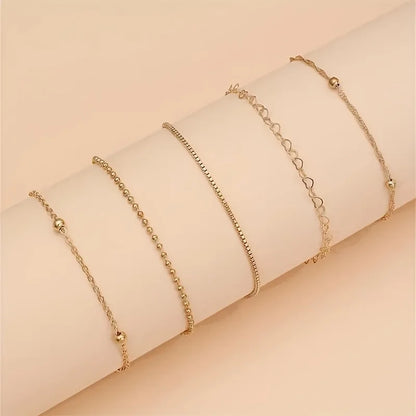 5er-Set Goldene Kettenarmbänder – Zierlicher Schmuck aus Zinklegierung, Eleganter Freizeitstil für Damen, Stapelbare Armbänder für den Alltag