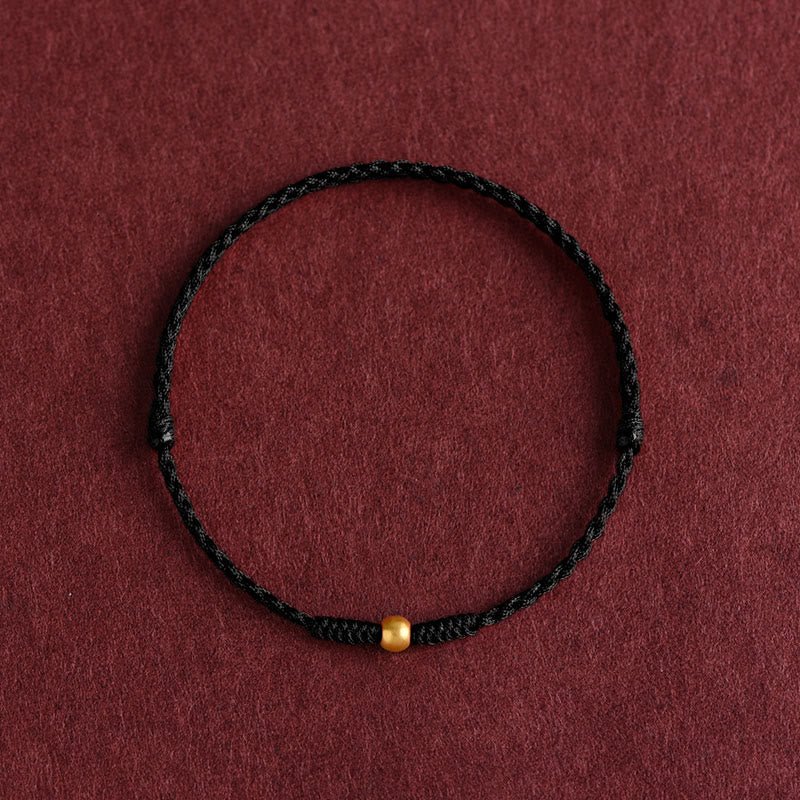 Handgemachtes Buddha - Armband mit Goldlegierung und geflochtenem Seil - Reminora
