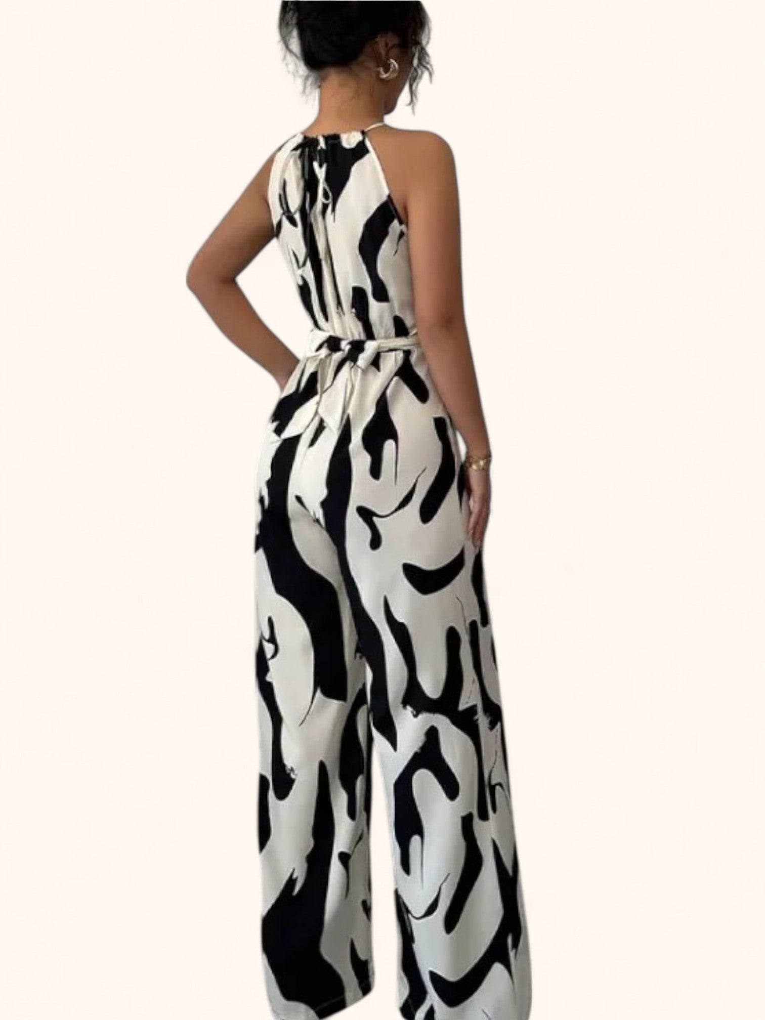 Ärmelloser Neckholder Jumpsuit mit weitem Bein – Eleganz pur